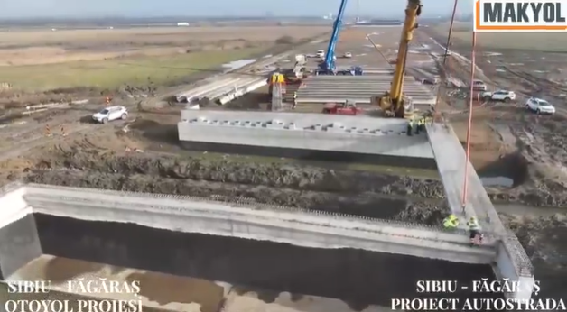 VIDEO Autostrada A13 Sibiu – Făgăraș: Turcii de la Makyol au montant prima grindă pe tronsonul 2