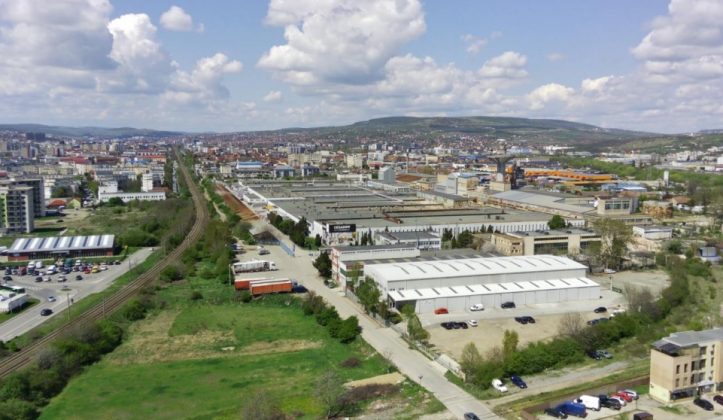 Vedere aeriană a terenului fostei fabrici Sanex din Cluj, pregătit pentru tranzacție teren Sanex Cluj și proiect reconversie urbană ca investiție imobiliară majoră. | sursa foto: Economica